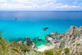 Aerial panoramic view of horizon and amazing tropical blue azure turquoise water of sea, rock cliff grass hill, yacht boat, blue Royalty Free Stock Photo