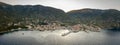 Aerial panoramic view of Komiza town coastline on Vis island before sunrise in Croatia Royalty Free Stock Photo