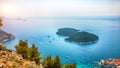 Aerial panoramic view of Lokrum island and Old Town of Dubrovnik on a sunny da Royalty Free Stock Photo