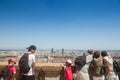 Aerial panoramic view of Lyon with children tourists pointing at the skyline and the Incity tower and Le Crayon during afternoon Royalty Free Stock Photo