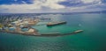 Aerial panoramic view of oil tanker and industrial wharfs. Royalty Free Stock Photo