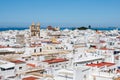 Aerial panoramic view of the old city rooftops and Cathedral de Santa Cruz in the afternoon from tower Tavira in Cadiz Royalty Free Stock Photo