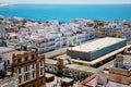 Aerial panoramic view of the old city rooftops and Cathedral de Santa Cruz in the afternoon from tower Tavira in Cadiz Royalty Free Stock Photo