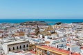 Aerial panoramic view of the old city rooftops and Cathedral de Santa Cruz in the afternoon from tower Tavira in Cadiz Royalty Free Stock Photo