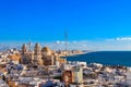 Aerial panoramic view of old city rooftops and Cathedral de Santa Cruz from tower Tavira in Cadiz, Andalusia, Spain Royalty Free Stock Photo