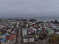 Aerial view over the center of Reykjavik, capital of Iceland, with streets and colorful buildings on cloudy day in winter. Royalty Free Stock Photo