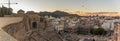 Aerial panoramic view of port city Cartagena in Spain with famous roman amphitheater. Beautiful sunset over the mountains. Wide