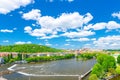 Aerial panoramic view of Prague city, historical center with Prague Castle, St. Vitus Cathedral, Hradcany district, green hills, V Royalty Free Stock Photo