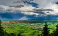 Aerial panoramic view of the rainbow over the green valley, drone shooting