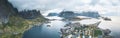Aerial drone panoramic view of Reine traditional fishing village in the Lofoten archipelago in northen Norway with blue Royalty Free Stock Photo