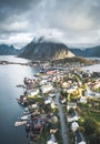 Aerial drone panoramic view of Reine traditional fishing village in the Lofoten archipelago in northen Norway with blue Royalty Free Stock Photo