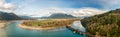 Aerial Panoramic View of a River in the valley surrounded by Canadian Landscape. Royalty Free Stock Photo