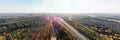 Aerial panoramic view of the road and forest in Finland