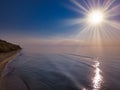 Aerial panoramic view of sunrise over sea. Nothing but sky, clouds and water. Beautiful serene scene Royalty Free Stock Photo