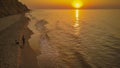 Aerial panoramic view of sunrise over sea. Nothing but sky, clouds and water. Beautiful serene scene Royalty Free Stock Photo