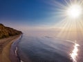 Aerial panoramic view of sunset over sea. Nothing but sky, clouds and water. Beautiful serene scene Royalty Free Stock Photo