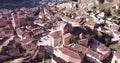 Aerial panoramic view of tiled housetops and Cathedral in medieval Daroca, Spain