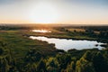 Aerial panoramic view to beautiful nature landscape at sunset, green forest, lake, awesome nature background Royalty Free Stock Photo