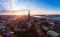 Aerial panoramic view to histirical center Riga, quay of river Daugava. Famous Landmark - st. Peter`s Church`s tower and