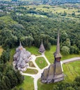Aerial panoramic view of traditional ancient Maramures wooden orthodox church in Transylvania with highest wooden Royalty Free Stock Photo