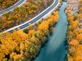 panoramic view of Venetikos river and serpentine highway road in autumn forest in Balkan Greece. Nature park background Royalty Free Stock Photo