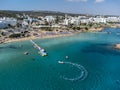 Aerial panoramic view on holidays resorts and blue crystal clear water on Mediterranean sea near Fig Tree beach, Protaras, Cyprus Royalty Free Stock Photo