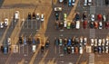 Aerial. Parking lot with cars, sunset