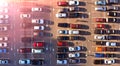 Aerial. Parking lot with a crowd of cars.