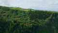 Aerial peaceful green hills summer day. Lush forest mountain slopes landscape Royalty Free Stock Photo