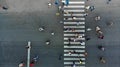 Aerial. Pedestrian crossing crosswalk. Top view.