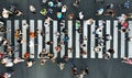 Aerial. Pedestrians on pedestrian crosswalk.