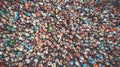 Aerial. People crowd background. Mass gathering of many people. Top view. Toned Royalty Free Stock Photo