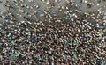 Aerial. People crowd on a city square background. Top view