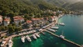 an aerial perspective of a busy marina, with numerous boats sailing and docked in the water, Aerial view of Marmaris in Mugla