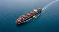 Aerial View of a Large Container Ship and Tugboat Sailing in the Ocean cargo ship cargo vessel Royalty Free Stock Photo