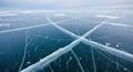 Stunning Aerial View of Thick Blue Ice Surface with Deep Cracks and Frost Patterns Royalty Free Stock Photo