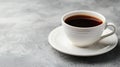 Aerial perspective of a coffee cup on a tabletop offering extensive area for custom text