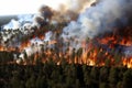 Aerial Perspective of an Enveloping Forest Fire Ravaging the Landscape Royalty Free Stock Photo