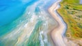 Aerial perspective of pristine beach shoreline with vibrant turquoise waters Royalty Free Stock Photo