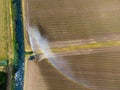 Aerial photo of agricultural land being irrigated during dry period summer