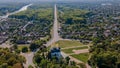 Aerial photo of ancient european Chernihiv town with church, trees and buildings near highway