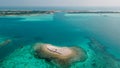 Aerial photo of the beautiful tropical islands in lagoon at the middle of indian ocean Royalty Free Stock Photo