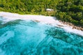 Aerial photo of bizarre paradise tropical beach Anse Bazarca at Mahe island, Seychelles. White sand, turquoise water