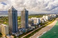 Aerial photo Blue and Green Diamond highrise modern upscale condominium on the ocean