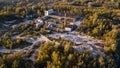 Aerial photo of brick`s making plant industrial complex with manufacturing buildings and trees Royalty Free Stock Photo