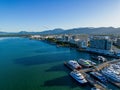 Aerial photo of Cairns biat harbour and cityscape with perfect blue water and sky