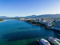 Aerial photo of Cairns biat harbour and cityscape with perfect blue water and sky