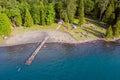 Aerial photo of Cultus Lake in Chilliwack, B.C. while people are enjoying the summer activities at the lakeshore and doing