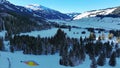 Aerial photo with drone of mountain landscape and balloon in Tannheimer Tal in winter