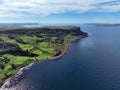 Aerial photo of Fair Head by the Atlantic Ocean on North Coast Antrim Northern Ireland Royalty Free Stock Photo